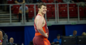Coon picks up 3 falls to reach semifinals at World Championships