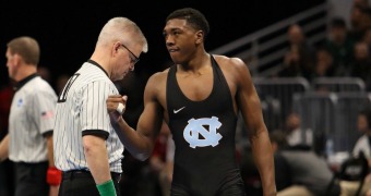 Monday pulls upset of opening session at NCAAs