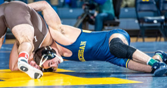 Michigan takes 7 bouts to beat Lehigh in home opener