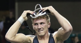 Grand View adds two-time national champ Henderson to coaching staff