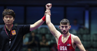 Arujau dominates world champ to reach finals of Junior Worlds